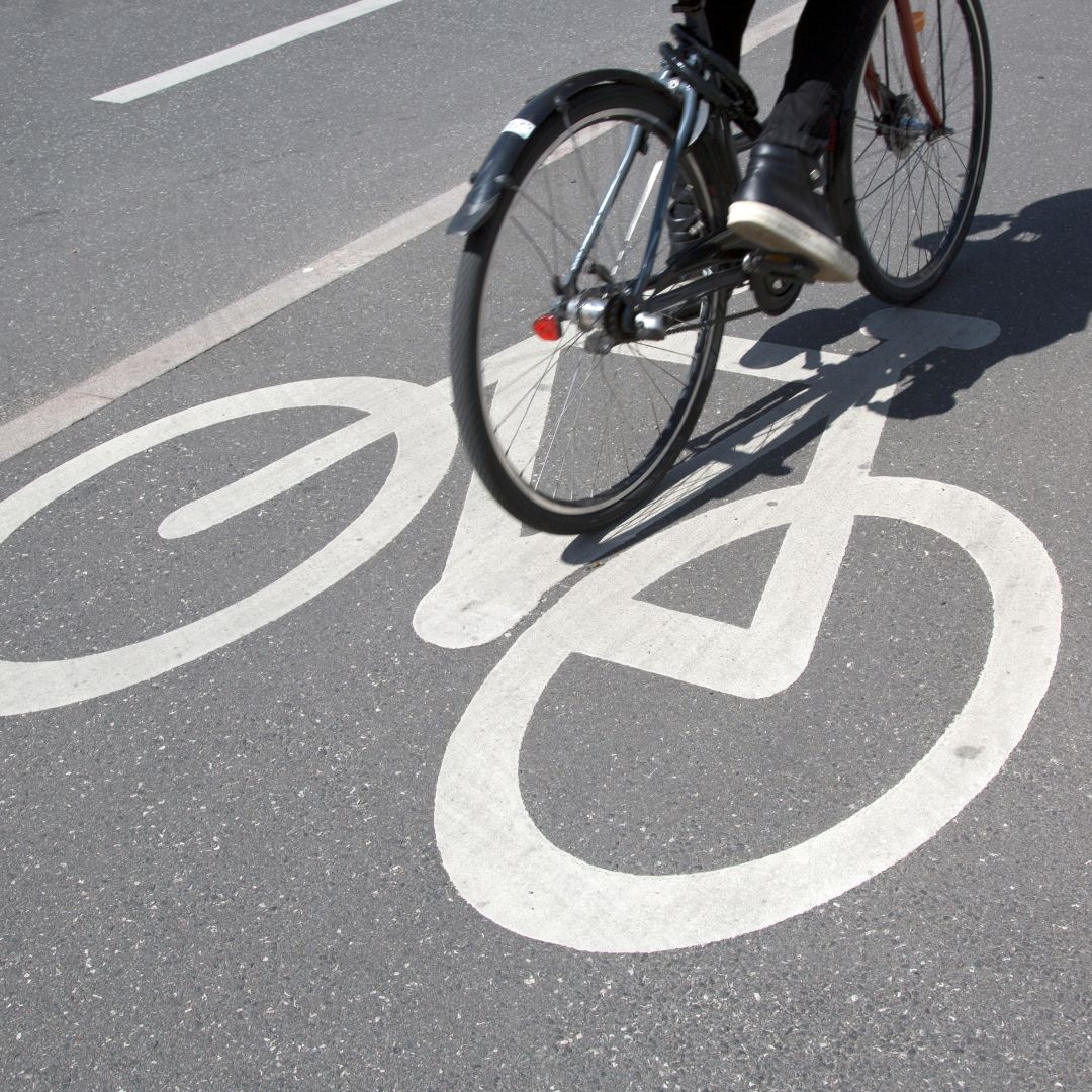 Person riding a bike in the bike lane.